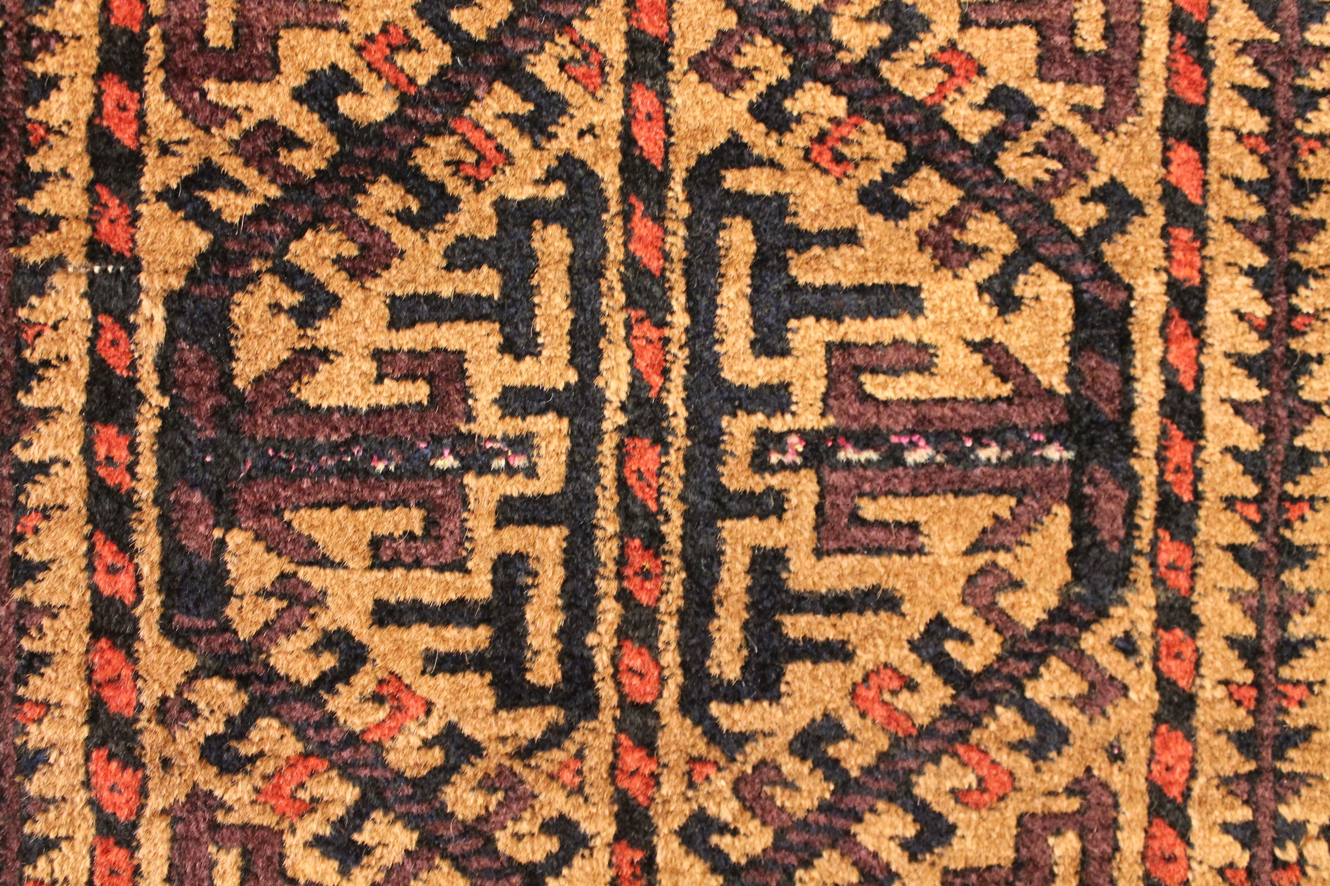 Antique Baluch rug